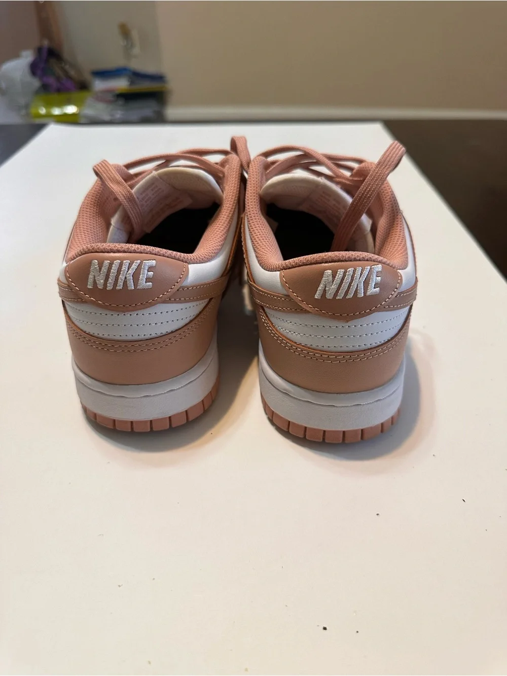 Nike Women's Low-Top Sneakers in White and Peach